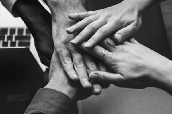 Hands joining together representing unity