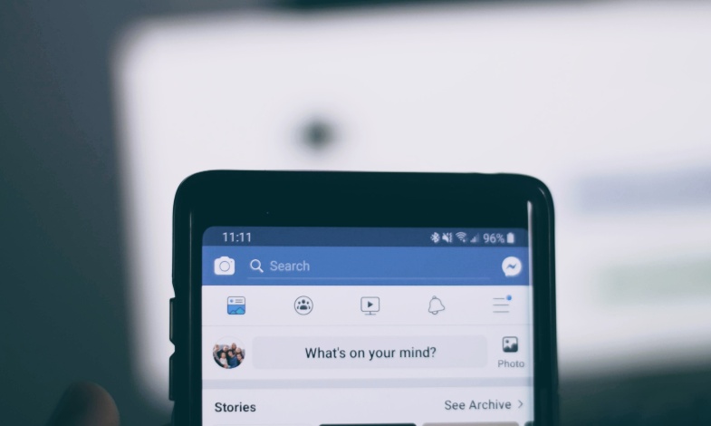 Facebook pulled up on a mobile phone