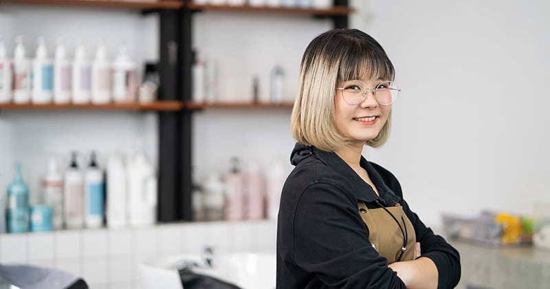 a woman in front of a shampoo bar