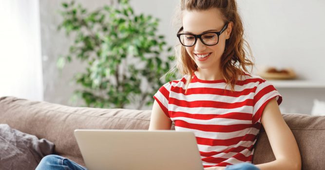 Woman booking an online salon appointment