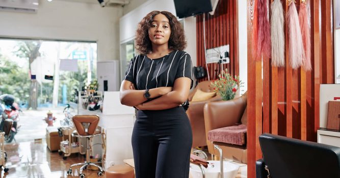 a woman standing in a salon