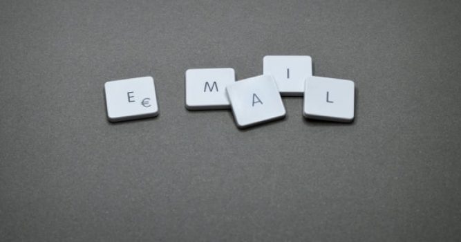 keyboard keys on gray background that spell email